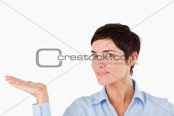 Close up of a businesswoman showing a copy space