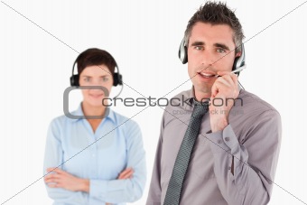 Isolated office workers using headsets