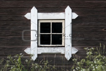 Window on wooden wall