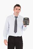 Accountant showing a calculator
