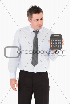 Accountant looking at a calculator