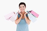 Cute woman holding shopping bags