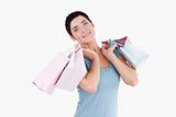 Cute woman posing with shopping bags