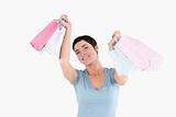Cheerful woman posing with shopping bags