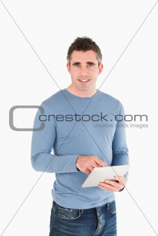 Portrait of a man with a tablet computer