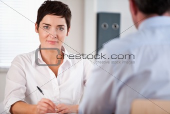 Manager interviewing a male applicant