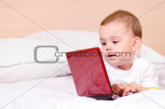 boy with red laptop