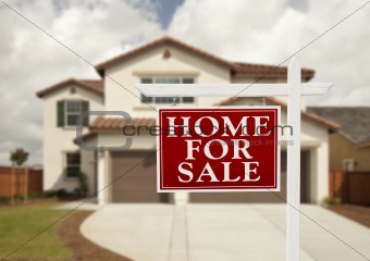 Home For Sale Real Estate Sign in Front of New House.