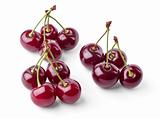 Three groups of juicy cherries view from top