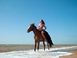nude woman on horseback