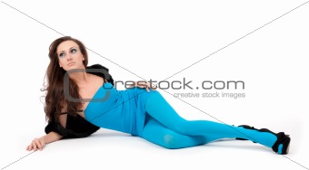 Portrait of a sexy young woman lying on the floor