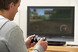 Man Playing With Game Console