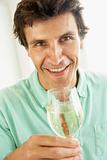Man Drinking A Glass Of White Wine