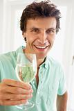 Man Drinking A Glass Of White Wine
