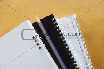 notebook with pencil 