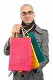 Young man with shopping bags