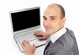 young businessman using laptop