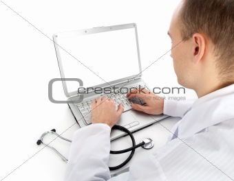 Rear view of a young doctor with laptop