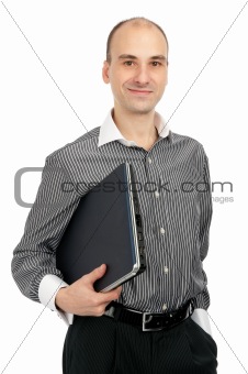 young man holding a laptop