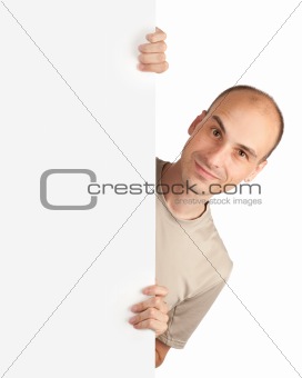 happy male standing by white blank card