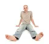 relaxed man sitting on the floor