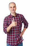 man in shirt showing his thumb up