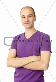 young man standing with arms crossed