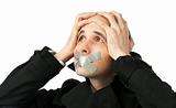 Businessman with his Mouth Taped shut