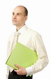 Portrait of young businessman with folder