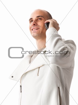 happy young guy speaking on cellphone