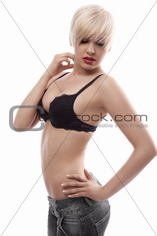 blond sensual girl posing against the white background