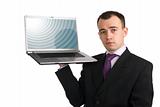 Business man holding a laptop computer