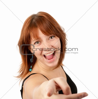 Portrait of a pretty young woman pointing at you