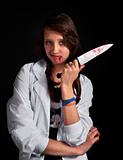 angry nurse with bloody knife over black