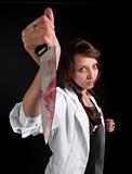 mad nurse holds a bloody knife