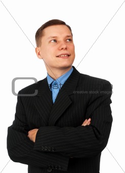 confident young business man with hands folded