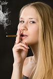 Young cute woman, smoking cigarette