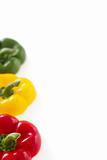 Three colorful bell pepper tops with copy space, isolated
