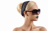 fashion shot of blond girl with sunglasses against white background