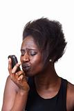 Beautiful Black Woman kissing mobile Phone