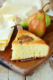 homemade cake with pears on a wooden table