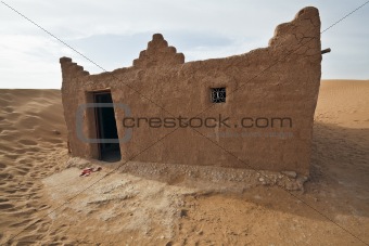 House in Sahara desert.