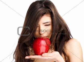 Female smeling red apple