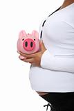 Pregnant woman holding piggy bank