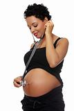 Pregnant woman with stethoscope