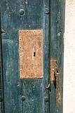 oxide lock on green wood door