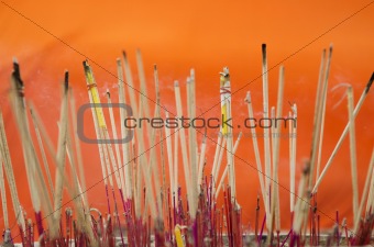 incense at buddhist temple in thailand