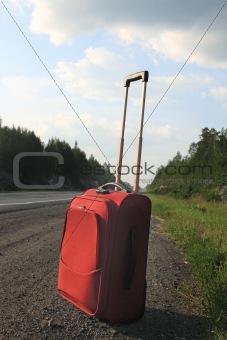 suitcase on the road