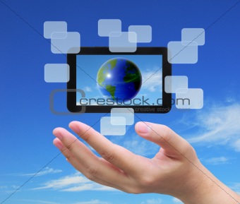 the world in touch pad PC on women hand