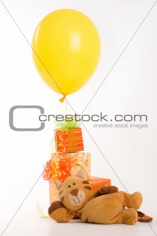 Funny toy cat with the gifts and balloon